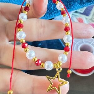 Gold and Red Star Charm Bracelet